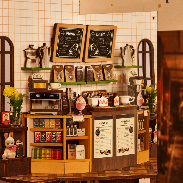 Φωτισμένο Rolife Holiday Café TGB15 ανάμεσα σε βιβλία